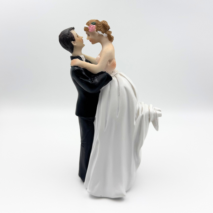 Bride And Groom Lifting Cake Topper